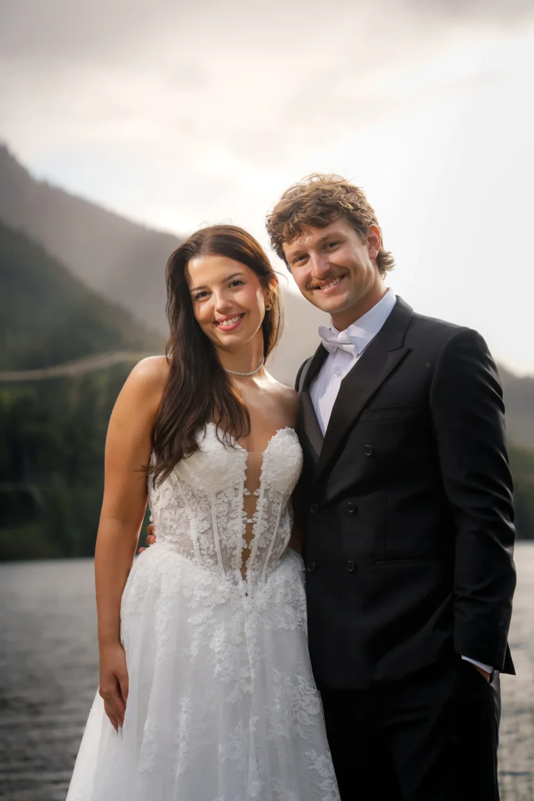 Bride and groom posing for an outdoor wedding portrait in Vancouver
