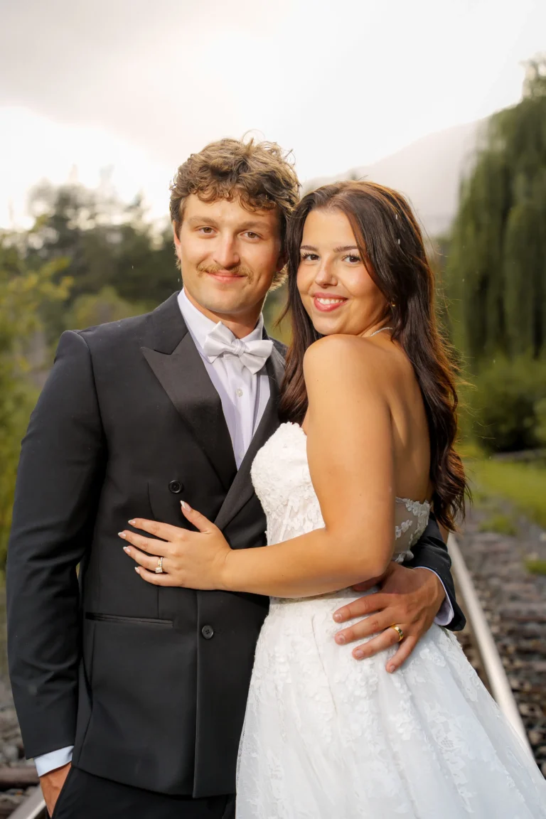Newlywed couple posing together for a Vancouver wedding portrait